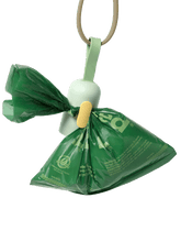 a used refill poop bag hanging off the handy yellow hook on the bag dispenser